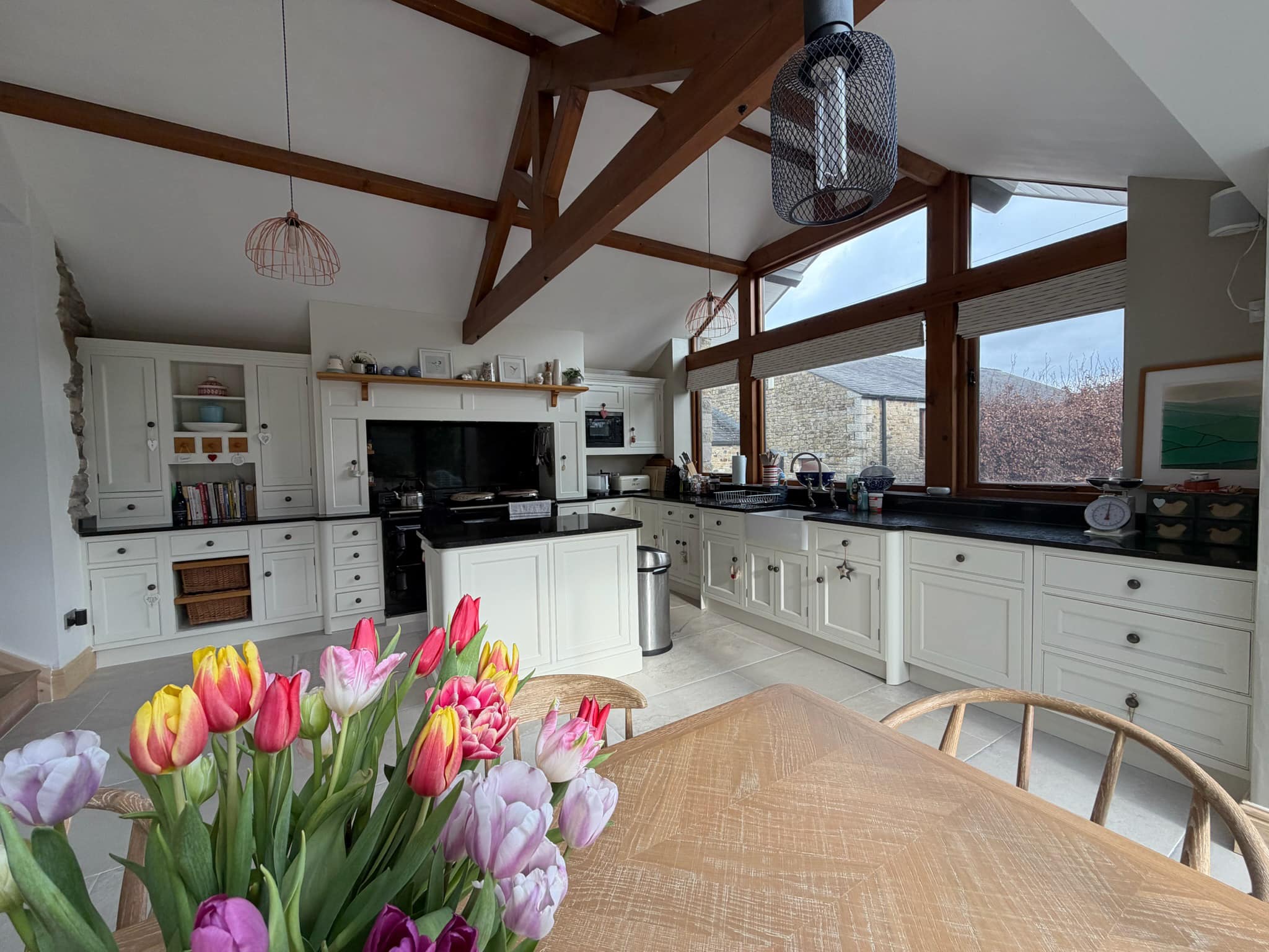 White farmhouse kitchen respray with exposed oak beams
