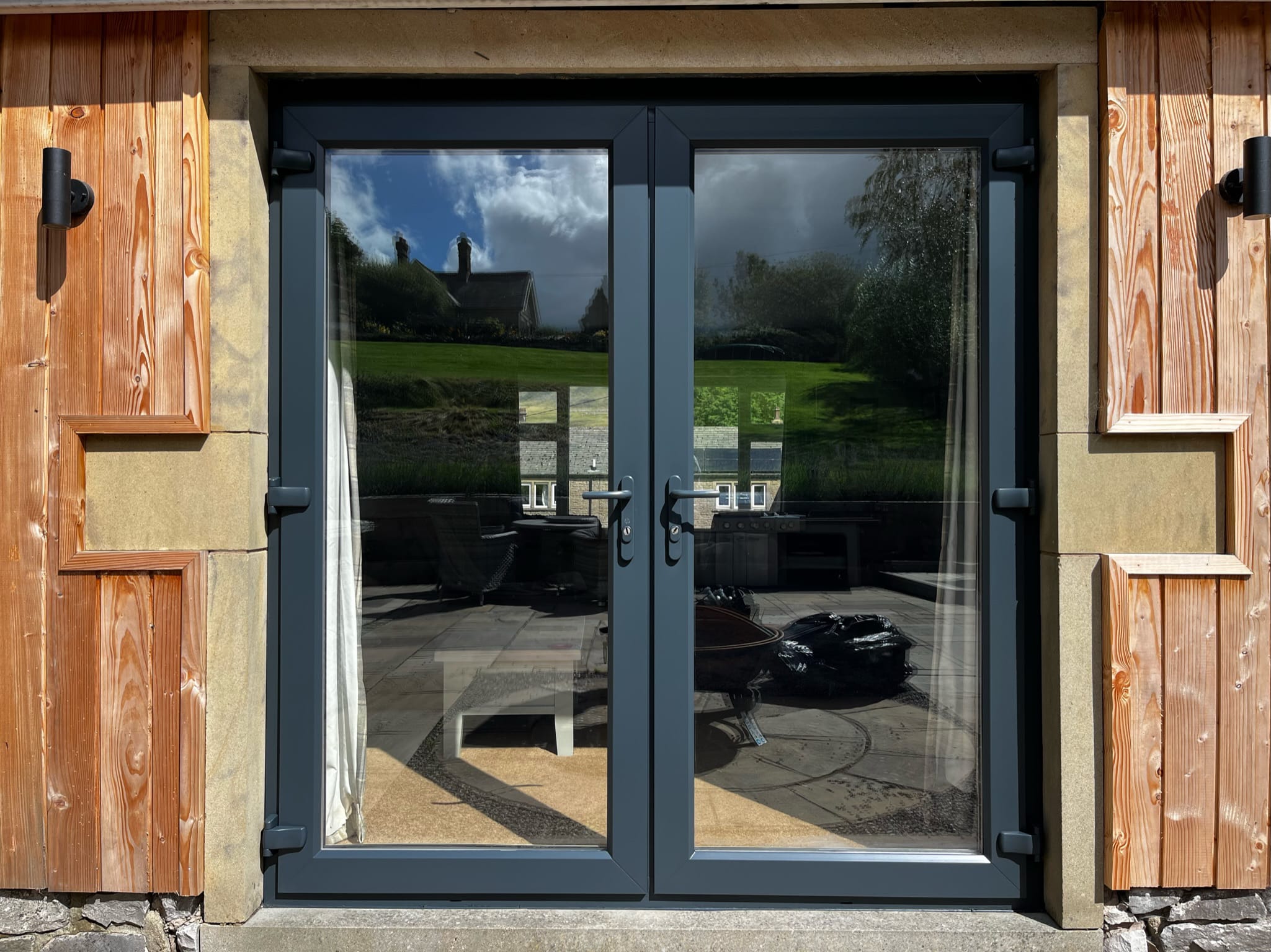 Anthracite grey uPVC bifold doors after a professional respray